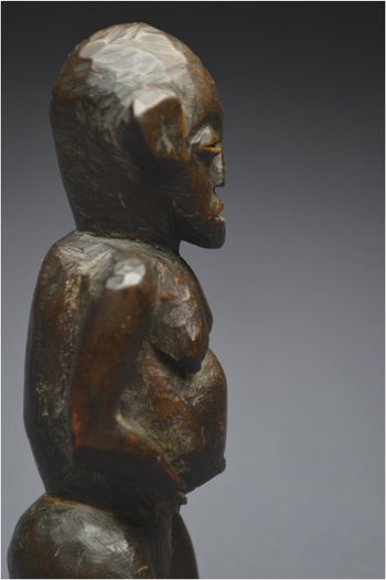 Tanzania, Zigwa people, Mid 20th century, Ancient anthropomorphic statuette with shiny patina