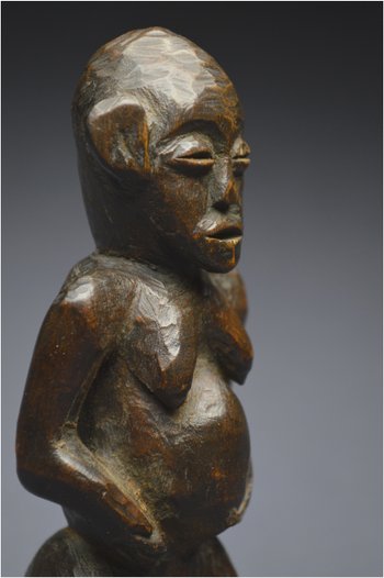 Tanzania, Zigwa people, Mid 20th century, Ancient anthropomorphic statuette with shiny patina