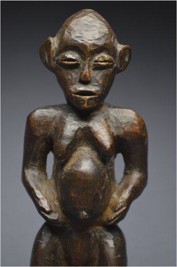 Tanzania, Zigwa people, Mid 20th century, Ancient anthropomorphic statuette with shiny patina