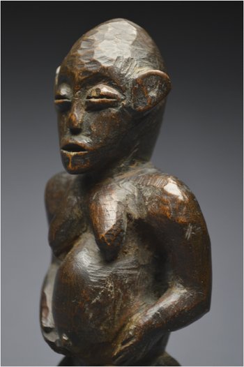 Tanzania, Zigwa people, Mid 20th century, Ancient anthropomorphic statuette with shiny patina