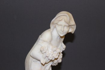 Alabaster Sculpture of a Young Woman with Roses About 1900