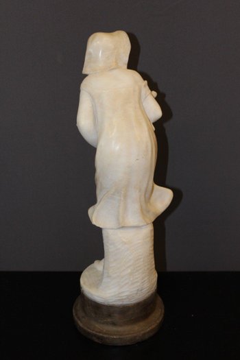 Alabaster Sculpture of a Young Woman with Roses About 1900