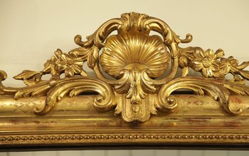 Grand miroir en bois et stuc doré, XIXème siècle 