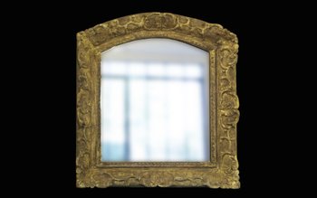 Miroir en bois doré Louis XIV