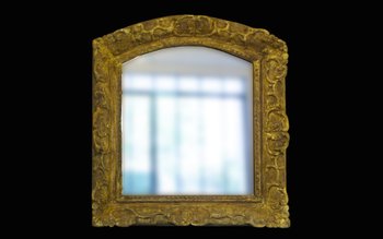 Miroir en bois doré Louis XIV