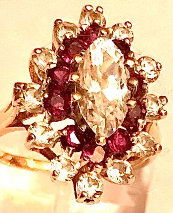 Marquise ring in gold, ruby, and circonium oxide