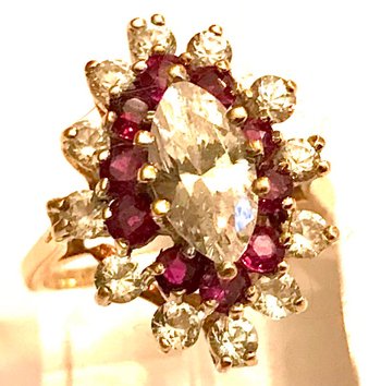 Marquise ring in gold, ruby, and circonium oxide