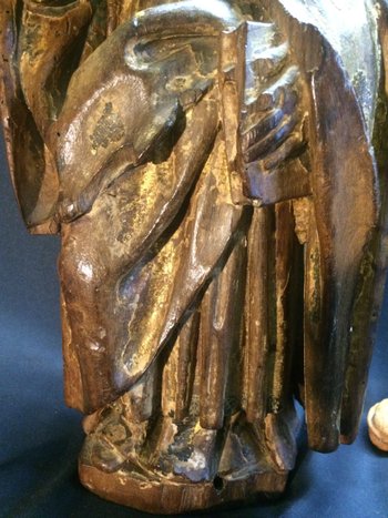 Holy man with a book, 17th century statue