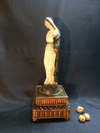 Virgin in wood carved on its support of the black forest.