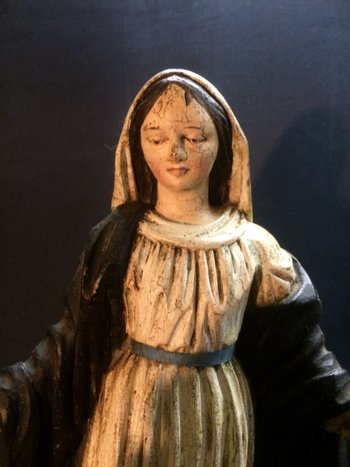 Virgin in wood carved on its support of the black forest.