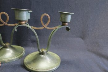 Pair of wrought iron design candle holders