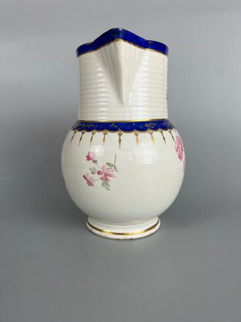 A late 18thc Derby jug hand painted in the manner of Edward Withers c.1775-80