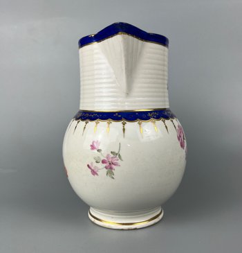 A late 18thc Derby jug hand painted in the manner of Edward Withers c.1775-80