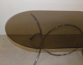 Smoked glass table with chrome base circa 1970