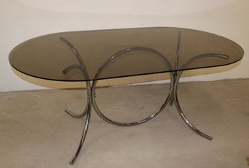 Smoked glass table with chrome base circa 1970