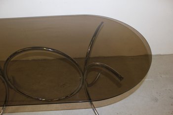 Smoked glass table with chrome base circa 1970