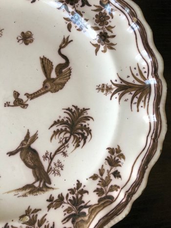 Plate In Moustiers Earthenware Decor With Grotesques Signed Jean Etienne Baron