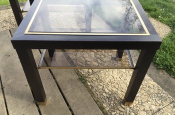 Pair of blackened wood and brass end tables circa 70