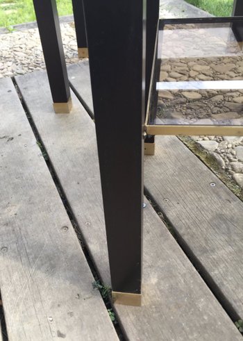 Pair of blackened wood and brass end tables circa 70