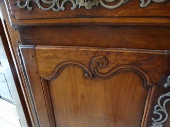 Sideboard with 2 drawers and 2 doors in molded walnut. Provencal work XVIIIth century