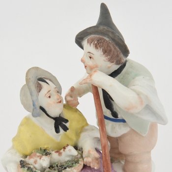 Group in polychrome porcelain of Vienna representing a couple of peasants 18th century