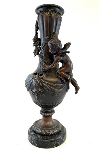 Pair of vases in regula with angel decoration