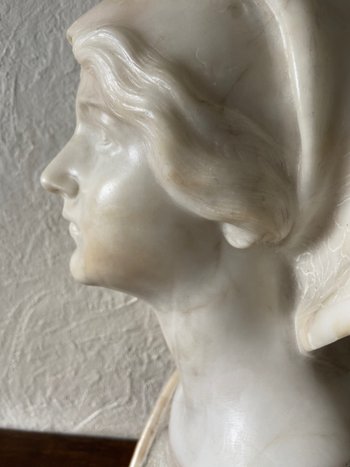 Bust of young woman