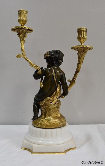 Pair of bronze candelabras "A Love and a Faun", after Clodion and Delarue - End of XIXth century