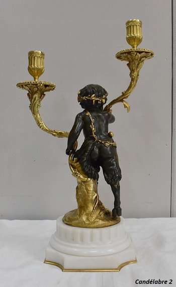 Pair of bronze candelabras "A Love and a Faun", after Clodion and Delarue - End of XIXth century