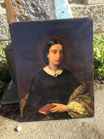 Portrait of a woman with a book.1860