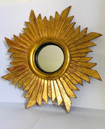 Radiant mirror in gilded wood with 20th century leaf