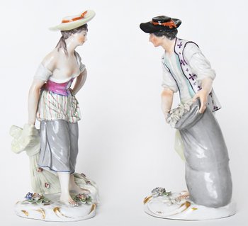 Pair of porcelain statuettes of Samson representing a couple of peasants