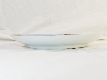 Large dish in LIMOGES or PARIS porcelain, circa 1900, decorated with MARTIN PECHEUR