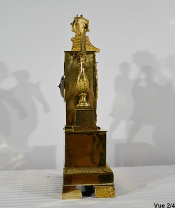 Uhr aus vergoldeter Bronze - Anfang 19.