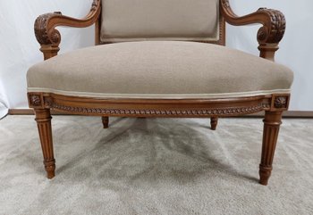 Fauteuil bas en Noyer massif, style Louis XVI – fin XIXe