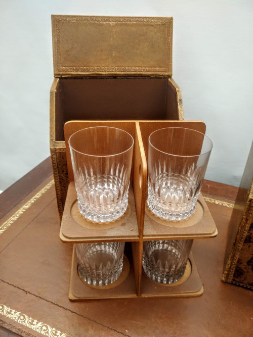 Pair of false book cases, with carafes and glasses.