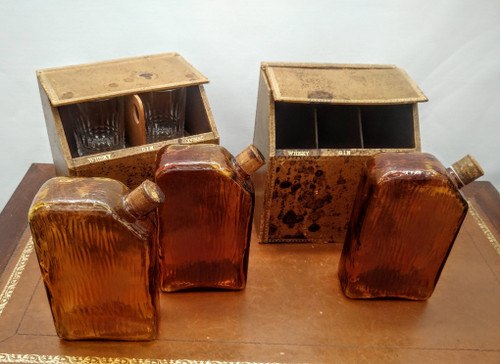 Pair of false book cases, with carafes and glasses.