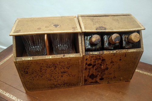 Pair of false book cases, with carafes and glasses.