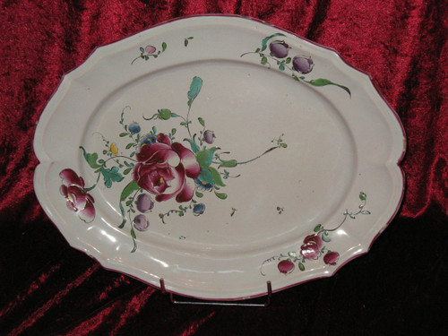 Oval dish in Sceaux earthenware from the 18th century with polychrome floral decoration