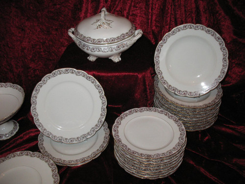 Part of a table service in porcelain of Paris, Louis XV decor, by Hache and Jullien in Vierzon