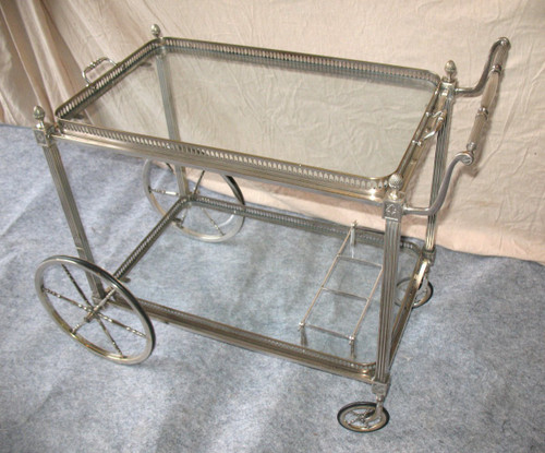 Table on wheels of the Bagués house in silver plated bronze of neo-classical style of the 40's