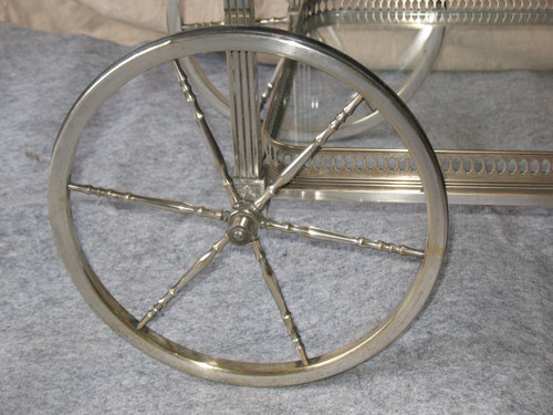 Table on wheels of the Bagués house in silver plated bronze of neo-classical style of the 40's