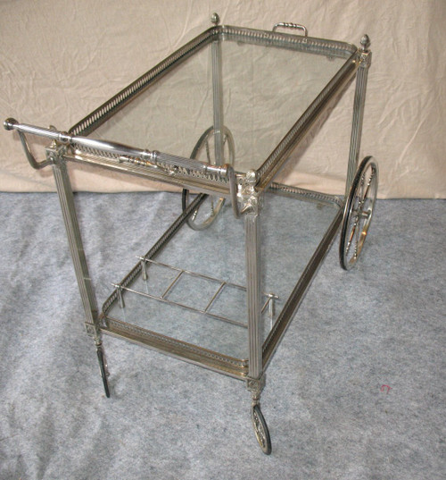 Table on wheels of the Bagués house in silver plated bronze of neo-classical style of the 40's