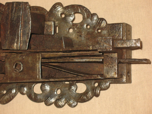 Strong wrought iron lock with its handle and key 17th century