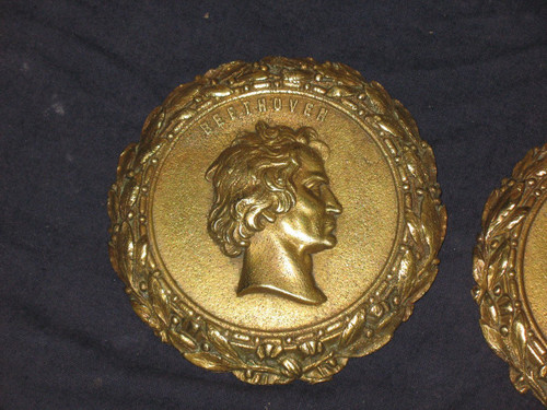 Pair of Louis XVI style bronze medallions with the effigy of Mozart and Beethoven, 19th century