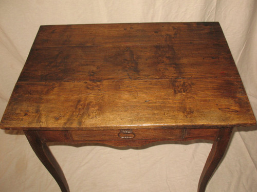 Small Louis XV period desk table in oak with an 18th century drawer