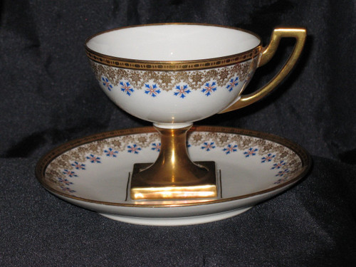 Cup and sugar bowl in Limoges porcelain by Jean Pouyat decorated with barbeaux, 19th century