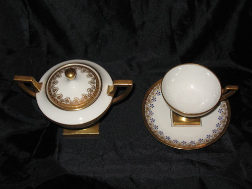 Cup and sugar bowl in Limoges porcelain by Jean Pouyat decorated with barbeaux, 19th century