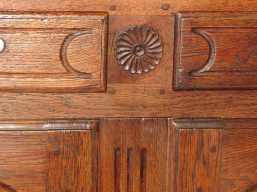 Low sideboard in molded and carved oak in the Louis XV style, 19th century