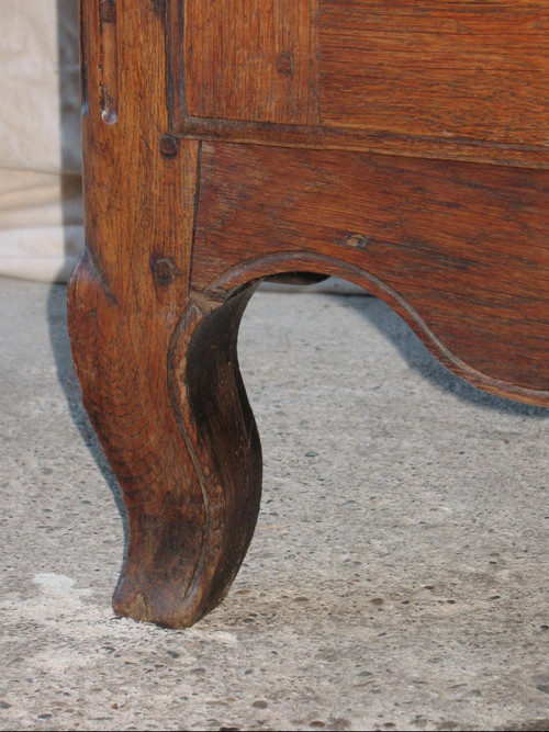 Low sideboard in molded and carved oak in the Louis XV style, 19th century